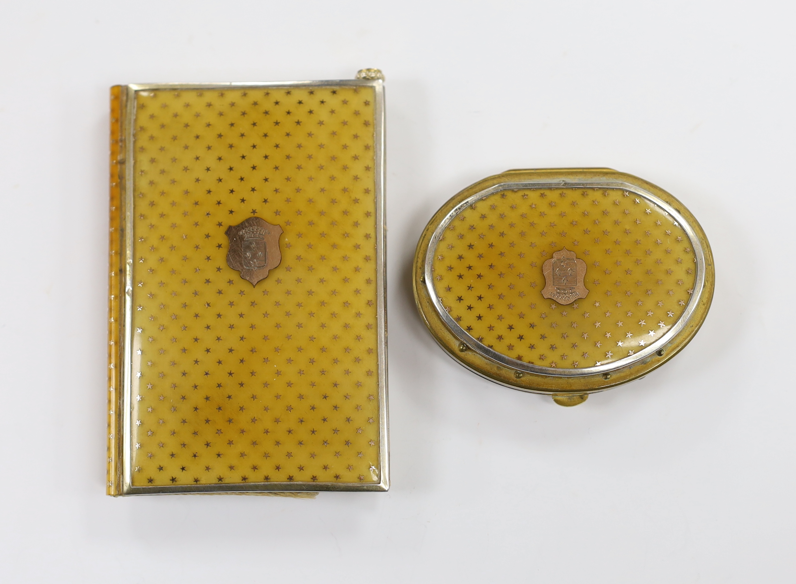 A Victorian yellow metal mounted pique aide memoire and matching purse, with crested applique, purse 7cm.